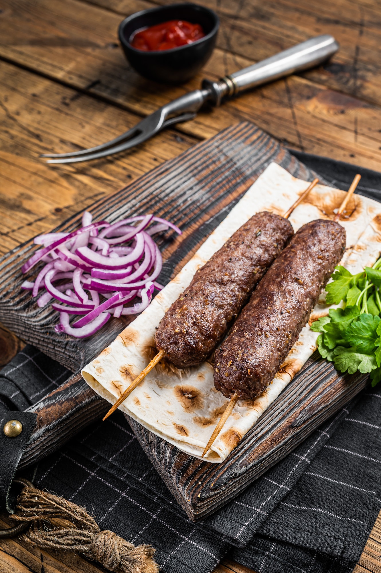 Traditional middle east kefta, kofta kebab from ground beef and lamb meat grilled on skewers served